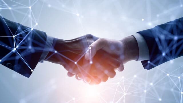 Picture of two people shaking hands